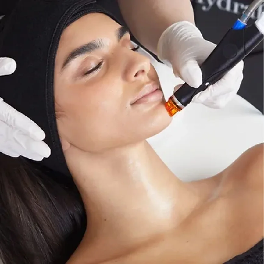 Woman Receiving Hydrafacial treatment at Posh Aesthetics in Frederck, MD