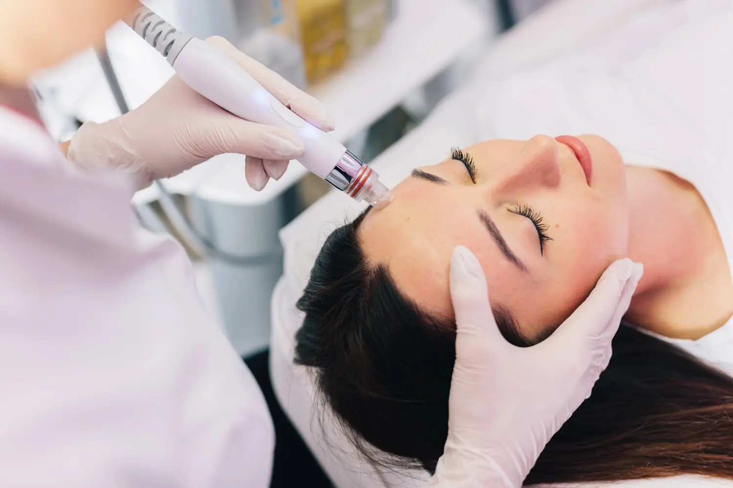 Woman Receiving Hydrafacial Treatment at a Medical Spa